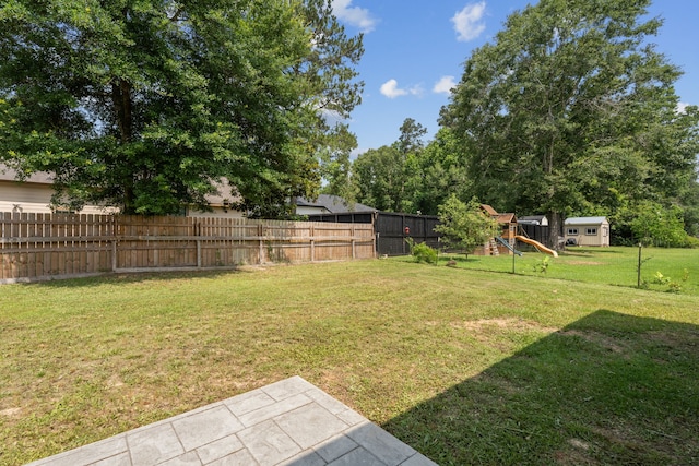 69 County Road 3668, Splendora, TX 77372 - view of yard featuring a playground
