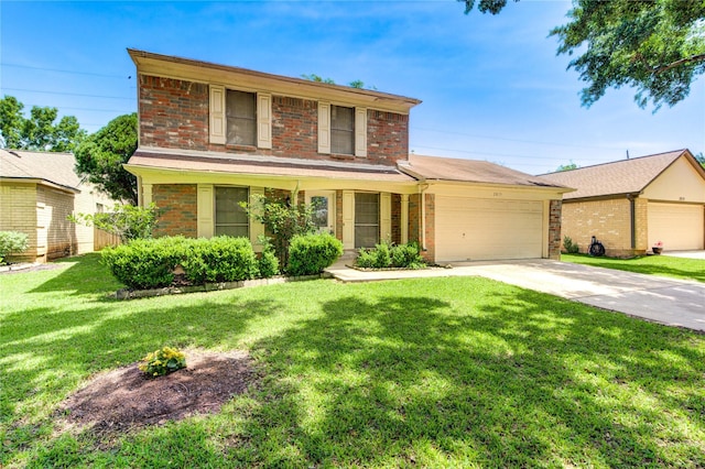 2815 Lakefield Way, Sugar Land, TX 77479 - traditional-style home with brick siding, a garage, a front lawn, and driveway