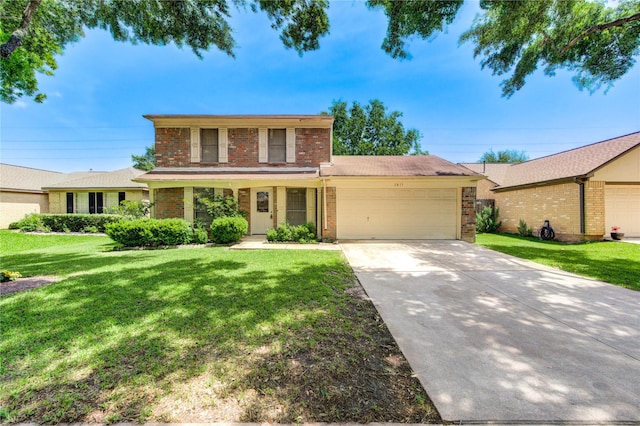2815 Lakefield Way, Sugar Land, TX 77479 - traditional home featuring brick siding, an attached garage, concrete driveway, and a front yard