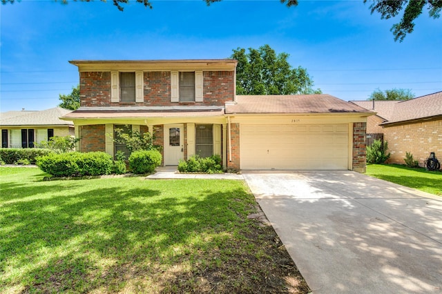 2815 Lakefield Way, Sugar Land, TX 77479 - traditional-style home with a garage, brick siding, a front yard, and concrete driveway