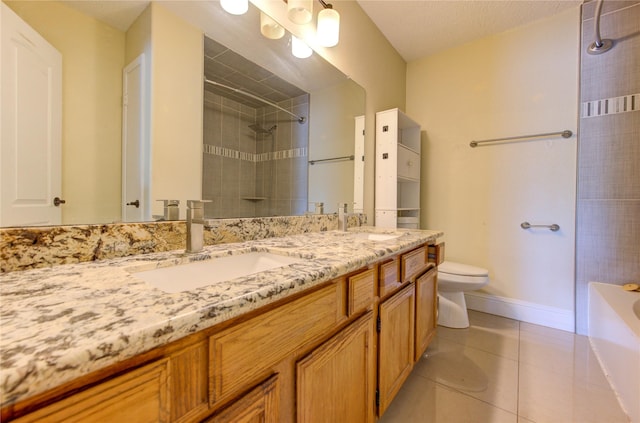 2815 Lakefield Way, Sugar Land, TX 77479 - bathroom featuring tiled shower, toilet, double vanity, a bath, and baseboards