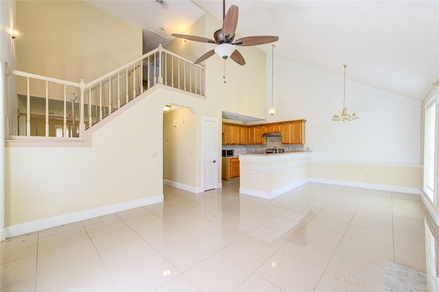 2815 Lakefield Way, Sugar Land, TX 77479 - unfurnished living room featuring high vaulted ceiling, a ceiling fan, light tile patterned flooring, baseboards, and stairway