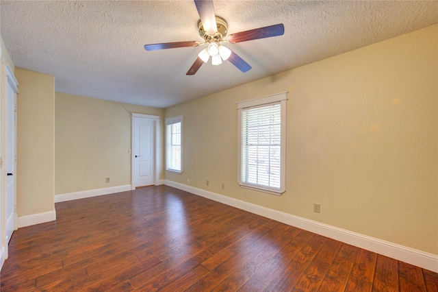 2815 Lakefield Way, Sugar Land, TX 77479 - empty room with dark wood-style flooring, a textured ceiling, a ceiling fan, and baseboards