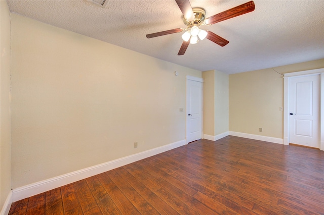 2815 Lakefield Way, Sugar Land, TX 77479 - unfurnished room with dark wood-type flooring, baseboards, ceiling fan, and a textured ceiling