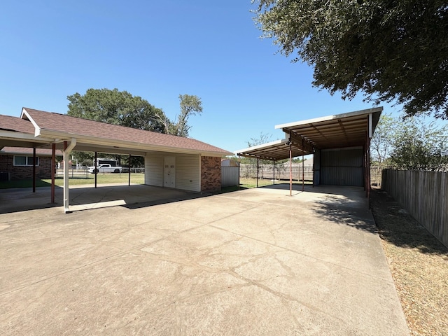 121 Briar Ln, Crockett, TX 75835 - view of car parking with a carport and concrete driveway