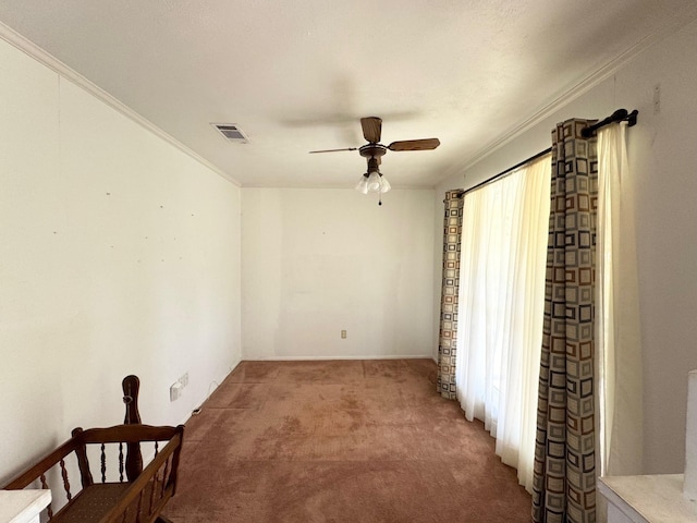 121 Briar Ln, Crockett, TX 75835 - carpeted spare room with ceiling fan and ornamental molding