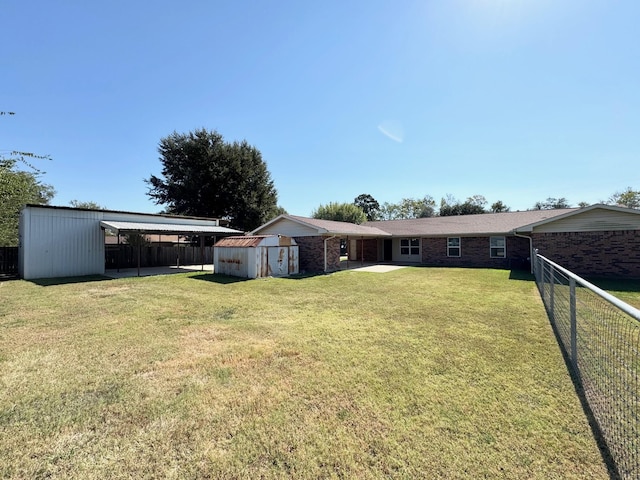 121 Briar Ln, Crockett, TX 75835 - rear view of house with brick siding