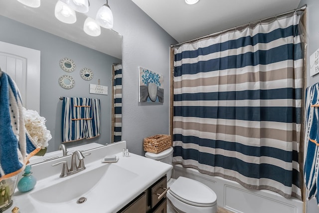20735 Cactus Lake Ln, Richmond, TX 77407 - full bathroom with toilet, vanity, a textured wall, and shower / bathtub combination with curtain