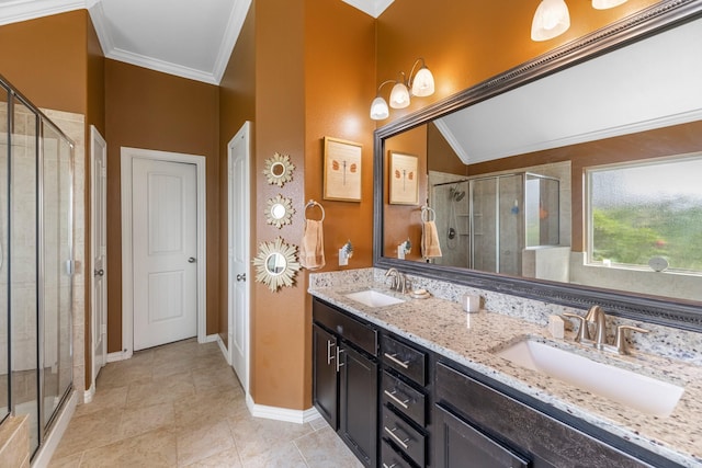 20735 Cactus Lake Ln, Richmond, TX 77407 - full bath with ornamental molding, a shower stall, double vanity, tile patterned flooring, and baseboards