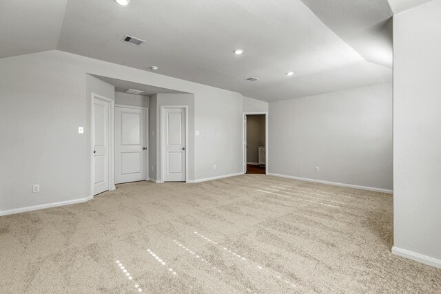 6405 Winter Elm St, Houston, TX 77048 - carpeted spare room with vaulted ceiling, baseboards, and recessed lighting