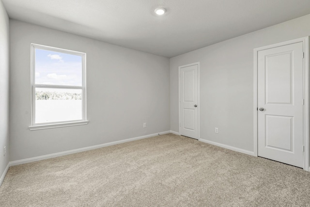 6405 Winter Elm St, Houston, TX 77048 - unfurnished bedroom with carpet and baseboards