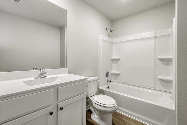 6405 Winter Elm St, Houston, TX 77048 - full bath with wood finished floors, toilet, vanity, and shower / tub combination