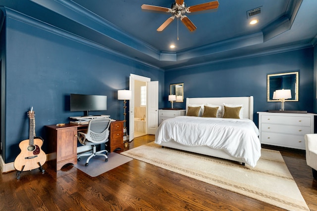 829 Wakefield Dr Unit A, Houston, TX 77018 - bedroom featuring a raised ceiling, ornamental molding, a desk, wood finished floors, and ensuite bathroom