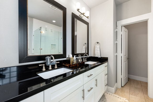 829 Wakefield Dr Unit A, Houston, TX 77018 - bathroom with marble finish flooring, baseboards, and double vanity