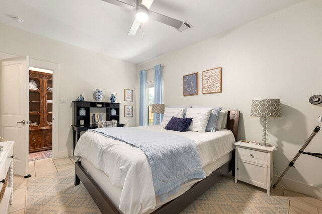 829 Wakefield Dr Unit A, Houston, TX 77018 - bedroom featuring light tile patterned flooring and ceiling fan