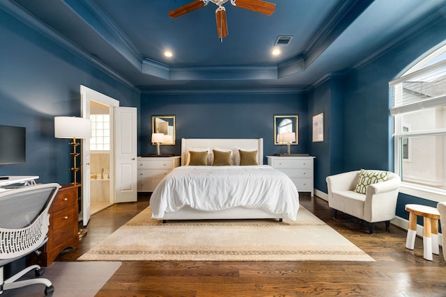 829 Wakefield Dr Unit A, Houston, TX 77018 - bedroom featuring ornamental molding, a raised ceiling, multiple windows, wood finished floors, and a desk
