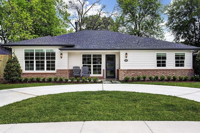 5326 Windswept Ln, Houston, TX 77056 - view of front of house featuring brick siding, a front yard, and a shingled roof