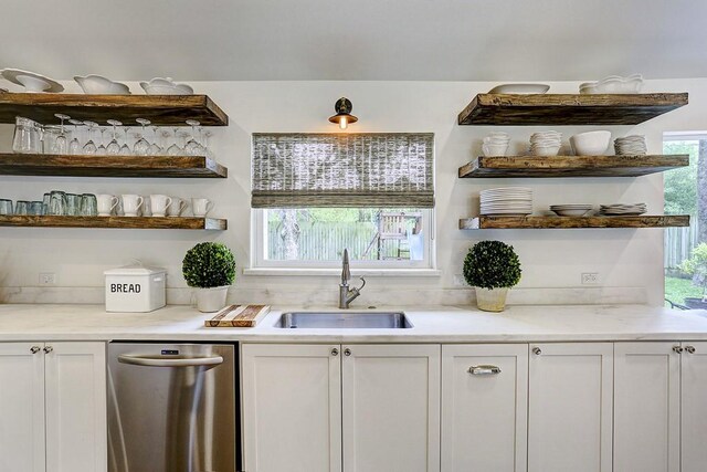 5326 Windswept Ln, Houston, TX 77056 - kitchen featuring open shelves, a sink, and white cabinetry