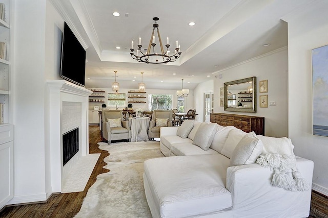 5326 Windswept Ln, Houston, TX 77056 - living area featuring a chandelier, dark wood-type flooring, recessed lighting, a tray ceiling, and ornamental molding