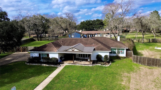 14902 Bernard Timbers Dr, East Bernard, TX 77435 - view of front of property featuring metal roof, a standing seam roof, stucco siding, and view of wooded area