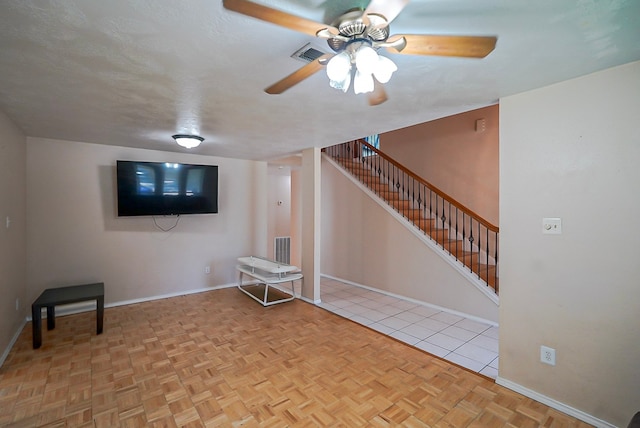 18907 Oak Bower Dr, Humble, TX 77346 - finished basement featuring ceiling fan, baseboards, and stairway