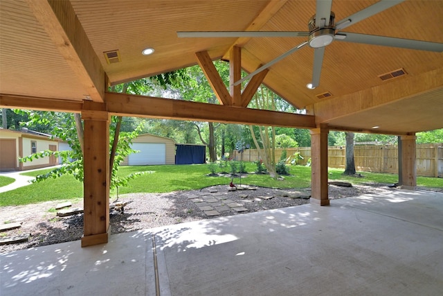 13111 Oak Plaza Dr, Cypress, TX 77429 - view of patio / terrace with a ceiling fan and an outbuilding