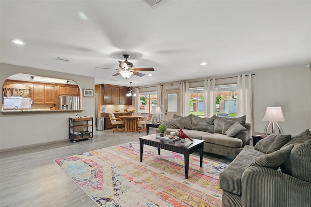13111 Oak Plaza Dr, Cypress, TX 77429 - living area featuring ceiling fan, recessed lighting, and light wood finished floors