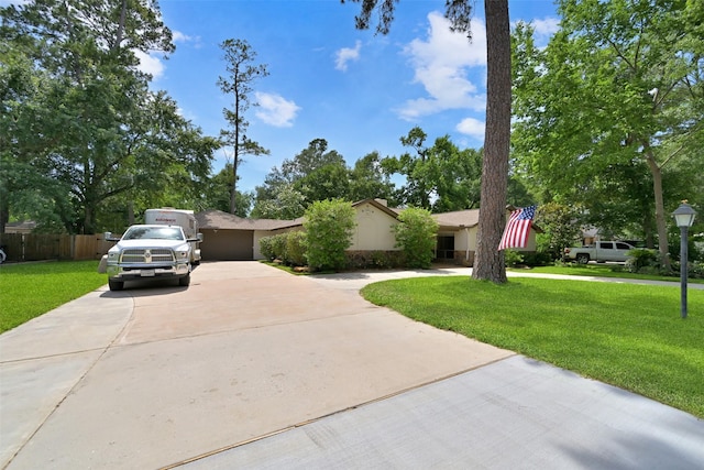 13111 Oak Plaza Dr, Cypress, TX 77429 - view of front of house with concrete driveway and an attached garage