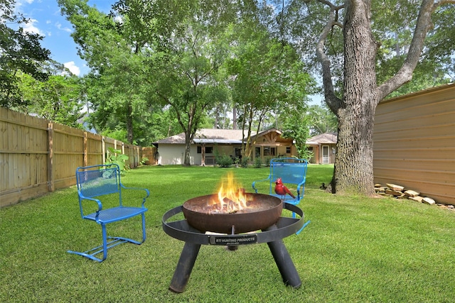 13111 Oak Plaza Dr, Cypress, TX 77429 - view of yard with a fire pit