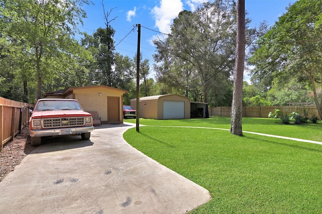 13111 Oak Plaza Dr, Cypress, TX 77429 - view of front of property with an outdoor structure, driveway, and a garage