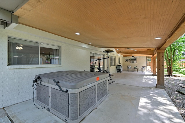 13111 Oak Plaza Dr, Cypress, TX 77429 - view of patio / terrace featuring ceiling fan and a jacuzzi
