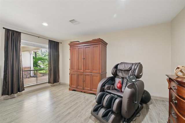 13111 Oak Plaza Dr, Cypress, TX 77429 - living area featuring light wood-style flooring, recessed lighting, and baseboards
