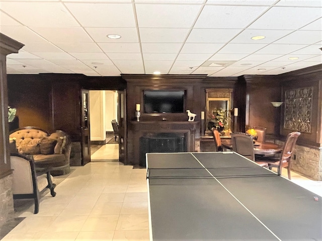 3525 Sage Rd Unit 404, Houston, TX 77056 - playroom featuring a drop ceiling, tile patterned floors, and recessed lighting