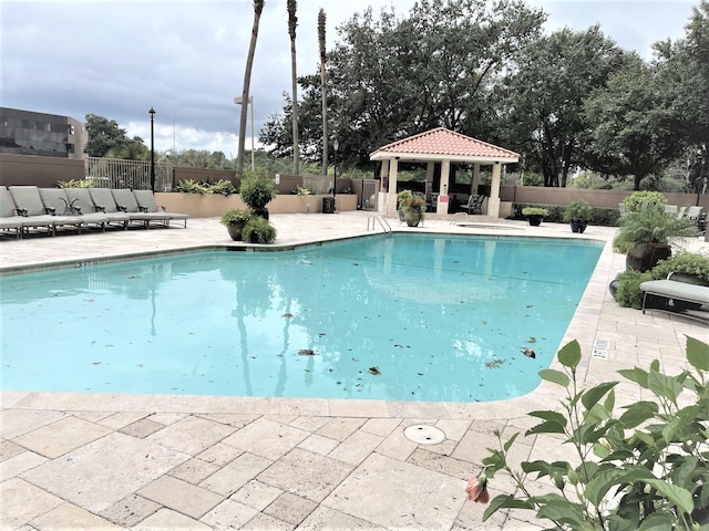 3525 Sage Rd Unit 404, Houston, TX 77056 - community pool with a gazebo, fence, and a patio