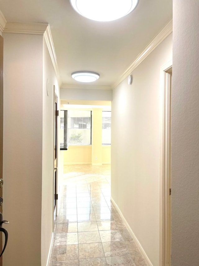 3525 Sage Rd Unit 404, Houston, TX 77056 - hallway featuring light marble finish flooring, crown molding, and baseboards