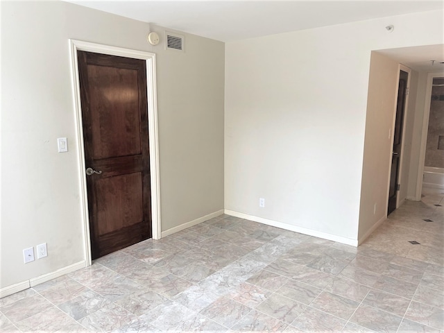 3525 Sage Rd Unit 404, Houston, TX 77056 - spare room featuring baseboards