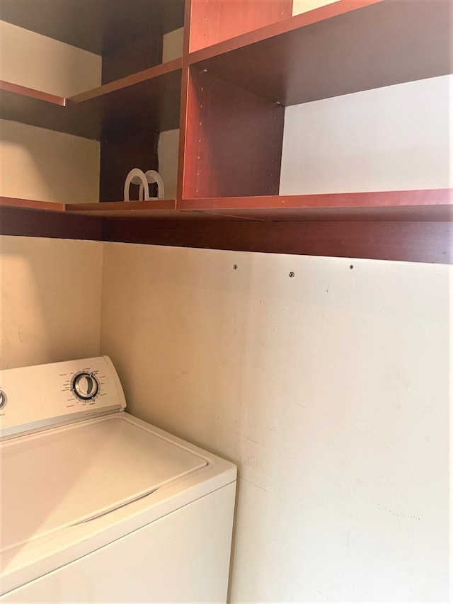 3525 Sage Rd Unit 404, Houston, TX 77056 - clothes washing area featuring washer / clothes dryer