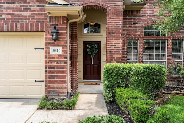 16810 Tranquility Park Dr, Cypress, TX 77429 - doorway to property with brick siding and a garage