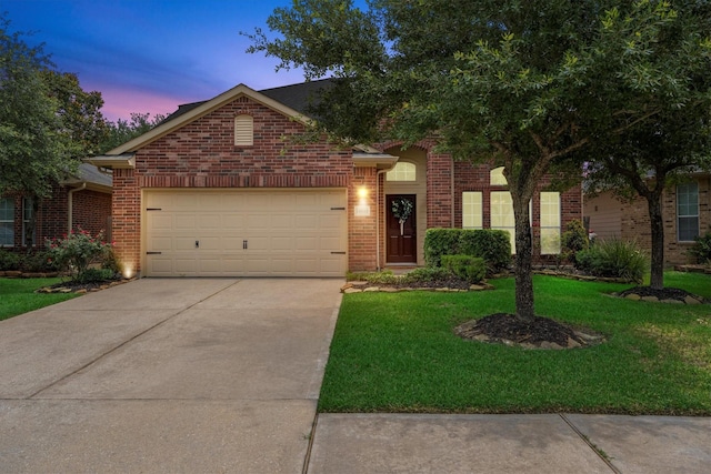 16810 Tranquility Park Dr, Cypress, TX 77429 - view of front of house with brick siding, concrete driveway, a garage, and a front yard