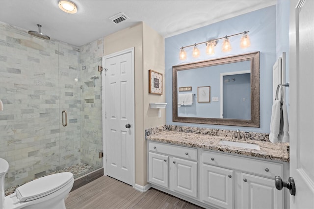 16810 Tranquility Park Dr, Cypress, TX 77429 - bathroom featuring a shower stall, vanity, and toilet