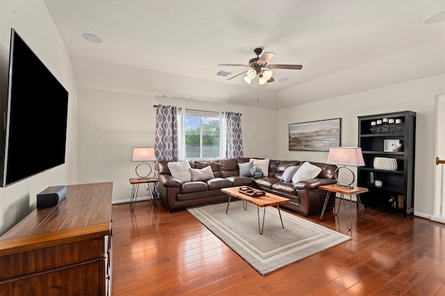 16810 Tranquility Park Dr, Cypress, TX 77429 - living room featuring ceiling fan and dark wood-style flooring