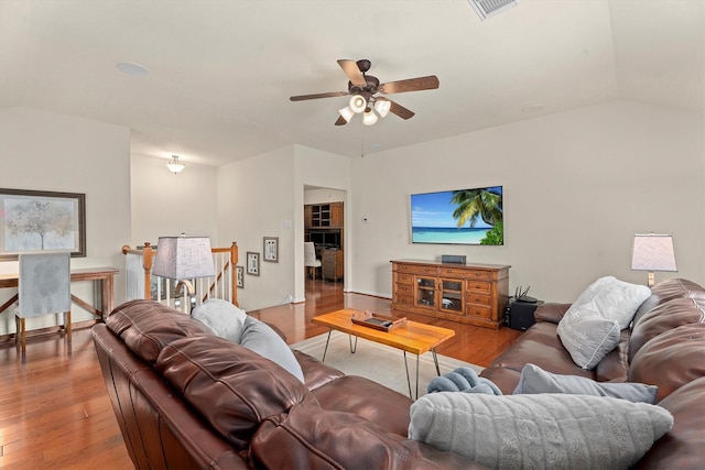 16810 Tranquility Park Dr, Cypress, TX 77429 - living area featuring ceiling fan, light wood-style floors, and lofted ceiling