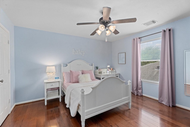 16810 Tranquility Park Dr, Cypress, TX 77429 - bedroom with wood-type flooring, baseboards, and a ceiling fan