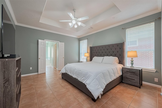 21122 Lilac Meadows Ln, Richmond, TX 77407 - bedroom featuring a tray ceiling, light tile patterned floors, baseboards, a ceiling fan, and crown molding