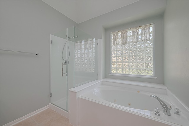 21122 Lilac Meadows Ln, Richmond, TX 77407 - bathroom with a stall shower, a jetted tub, and tile patterned floors