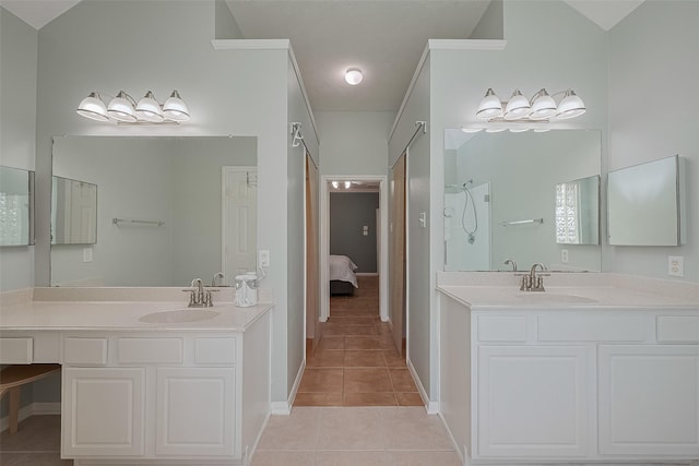 21122 Lilac Meadows Ln, Richmond, TX 77407 - ensuite bathroom with tile patterned floors, a shower, and two vanities