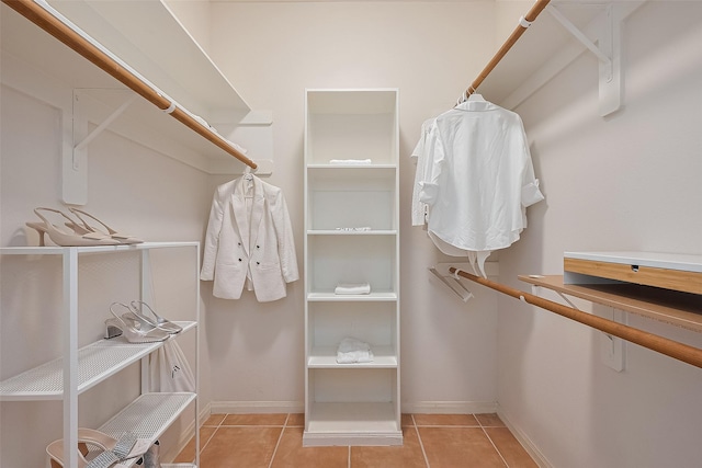 21122 Lilac Meadows Ln, Richmond, TX 77407 - walk in closet with tile patterned floors