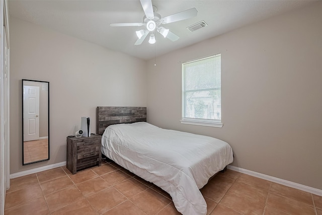 21122 Lilac Meadows Ln, Richmond, TX 77407 - bedroom with light tile patterned flooring, baseboards, and a ceiling fan