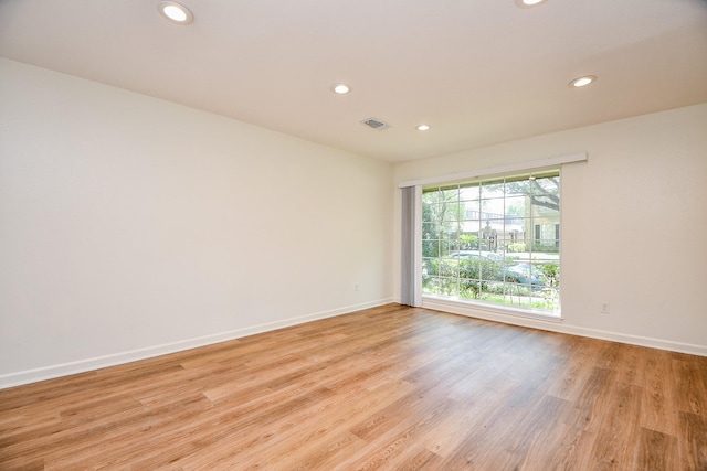 500 N Post Oak Ln, Houston, TX 77024 - empty room featuring recessed lighting, baseboards, and light wood finished floors