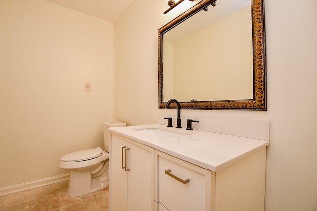 500 N Post Oak Ln, Houston, TX 77024 - half bathroom with baseboards, toilet, and vanity